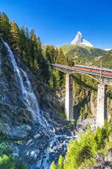 Transport Infrastructure Prints: Gornergrat Bahn train on viaduct with Matterhorn in the background
