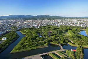 Fortifications Prints: Goryokaku Palace shows a unique star shape surrounded by green trees and waterways in Hakodate