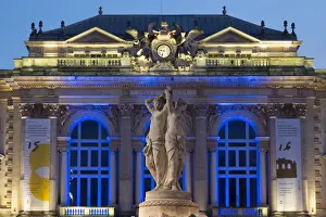 Bright Color Prints: The Three Graces fountain and the Opera in Place de la Comedie in the city of Montpellier at night