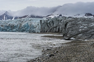 Hornsund Prints: Gravel beach before a huge glacier in Hornsund, Svalbard, Arctic