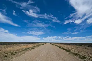 Dirt Track Prints: Gravel road through the desert of Patagonia, Chile, South America