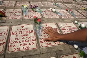 Nha Trang Prints: Graves containing cremation ashes in the wall of Nha Trang Cathedral