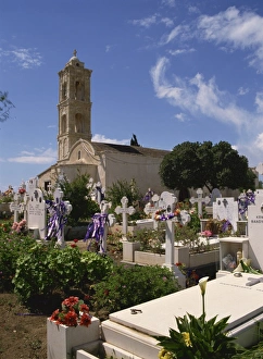 Grave Yard Prints: Graves decorated for Easter in front of church at Kiti, Cyprus, Europe