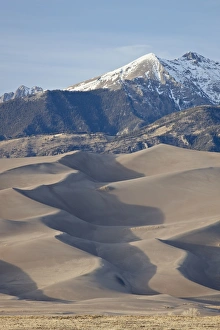 National Parks And Preserve Prints: Great Sand Dunes and mountains with snow, Great Sand Dunes National Park and Preserve