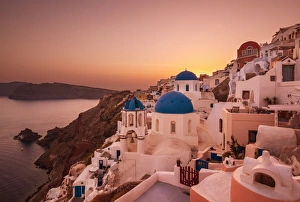 Aegean Prints: Greek church with three blue domes at sunset