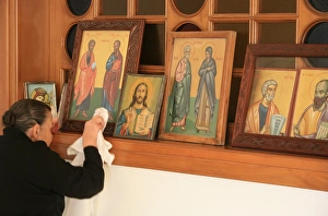 Thessaloniki Prints: Greek Orthodox woman cleaning icons, Thessaloniki, Macedonia, Greece, Europe
