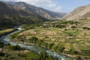 Arable Farming Prints: The green of the irrigated fields contrasts with the arid hills above, a testament