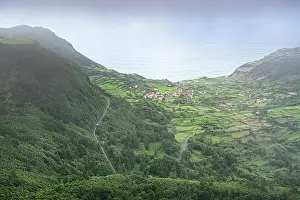 Azores Prints: Green valley with houses and fields surrounded by hills on Flores Island in Portugal