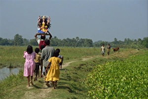 Children Prints: Group delivering Hindu god model to village
