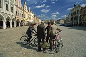South Moravia Prints: A group of elderly men talking in the 16th century town square in Telc