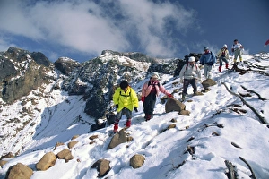 Trekker Prints: A group of hikers descending on Mount Furanodake in the autumn