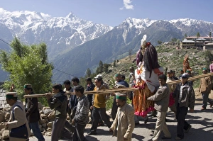 Deities Prints: Group of local men in religious procession with the local deity