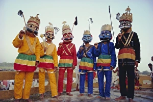 Disguise Prints: Group portrait of masked actors in the Ramlilla