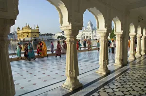 National Famous Place Prints: Group of Sikh women pilgrims walking around holy pool