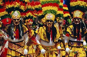Clothes Prints: A group of Tobas performing the Devil Dance - La Diablada, during the carnival