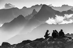 Monochrome Collection: A group of trekkers relaxing after a long day at New Shira Camp on the Machame Route up