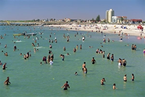Swimming Prints: Groups of people in the sea and on the beach at Glenelg, a resort suburb of Adelaide