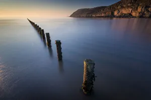 Groynes, Brean Beach, with Brean Down in far distance, Somerset, England, United Kingdom