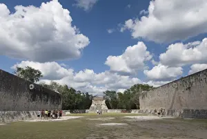 Chichen Itza Prints: Guide lecturing to tourists in the Great Ball Court (Gran Juego de Pelota)