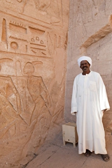 Nubian Prints: Guide at Nubian monuments, Abu Simbel, Egypt, North Africa, Africa