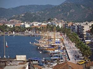 Asia Minor Prints: Gulets in the harbour with the town and hills in the background