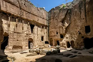 Caves Prints: Gumusler ancient monastery features caves carved into rock in Turkey