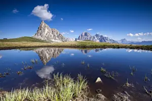 The Gusela peak and the Tofane Group by Cortina D Ampezzo reflecting in the lake by Passo Giau, Veneto, Italy, Europe