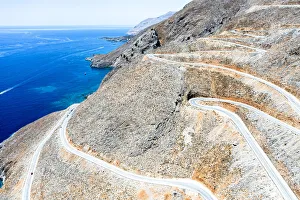 Country Road Prints: Hairpin bends of mountain road leading to the blue sea