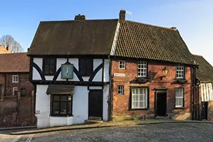 Street View Prints: Half-timbered Harlequin, antique book store in historic building