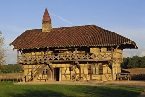 Half timbered traditional farm with tile roof, at St. Trivier de Courtes near Bourg en Bresse