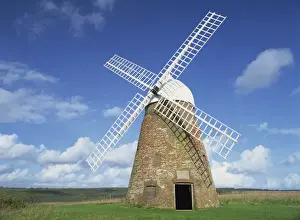 Halnaker Windmill, a restored 18th century brick tower mill, on top of Halnaker Hill in South Downs