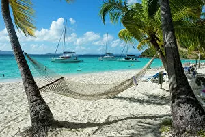 Trending: Hammock hanging on famous White Bay, Jost Van Dyke, British Virgin Islands, West Indies