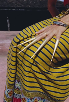 Skirt Prints: Detail of hand and skirt of a Thai dancer