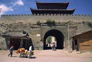 Town Wall Prints: Handcart beside the City Wall of Songpan in Sichuan Province, China, Asia