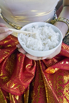 Chop Stick Prints: Hands holding a bowl of rice
