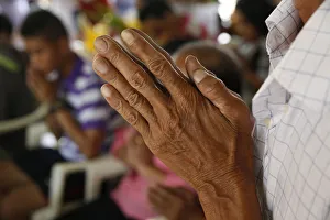 Closeup View Gallery: Hands in prayer, Khao Pansa celebration at Wat Ampharam, Hua Hin, Thailand