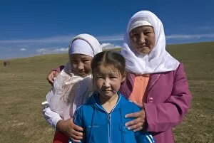 Happy nomad family, Song Kol, Kyrgyzstan, Central Asia, Asia