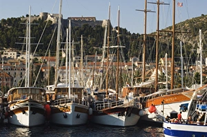 Hvar Island Prints: Harbour area and Venetian fortress dating from 1551 on the hill, Hvar Island