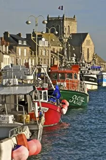 Images Dated 19th November 2009: Harbour and fishing boats with houses and church in the background, Barfleur