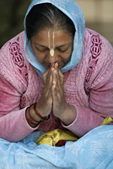 Foreground Focus Prints: Hare Krishna devotee praying, Vrindavan, Uttar Pradesh, India, Asia
