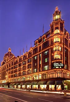 Harrods Department store, illuminated at night, Knightsbridge, London, England