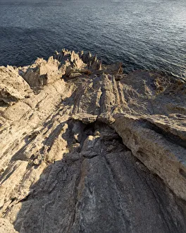 Antiparos Island Prints: Harsh rock cliffs on Antiparos Island, Cyclades, Greek Islands, Greece, Europe