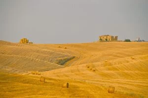 Hay bales in field at sunset, Val d Orcia, Siena province, Tuscany, Italy, Europe