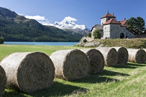 Images Dated 16th September 2008: Haystacks lying on the bank of Lake Sils in Silvaplana, by Saint Moritz, Graubunden Switzerland