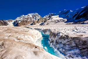 Blue Ice Prints: Helicopter landing on West Fork Glacier in Alaska, United States of America, North