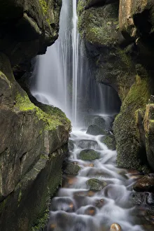 Flowing Water Prints: Hidden waterfall in the cliffs behind Singing Sands Beach, Cleadale, The Isle of Eigg