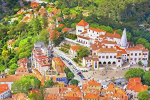 Sintra Prints: High angle view of Sintra National Palace surrounded by buildings and greenery in Sintra Portugal