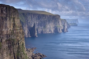 High cliffs between 200 and 300m high, on west coast of Sandoy, Svartskorardrangur High cliffs between 200 and 300m high, on west coast of Sandoy, Svartskorardrangur