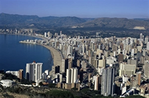 Apartment Building Prints: High rise apartments lining beach zone