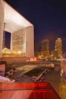 Office Buildings Prints: High rise office buildings and La Grande Arche in the La Defense area at night